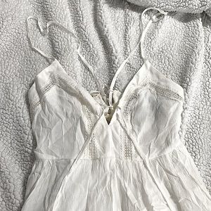 Forever 21 contemporary white dress size S. Never worn!